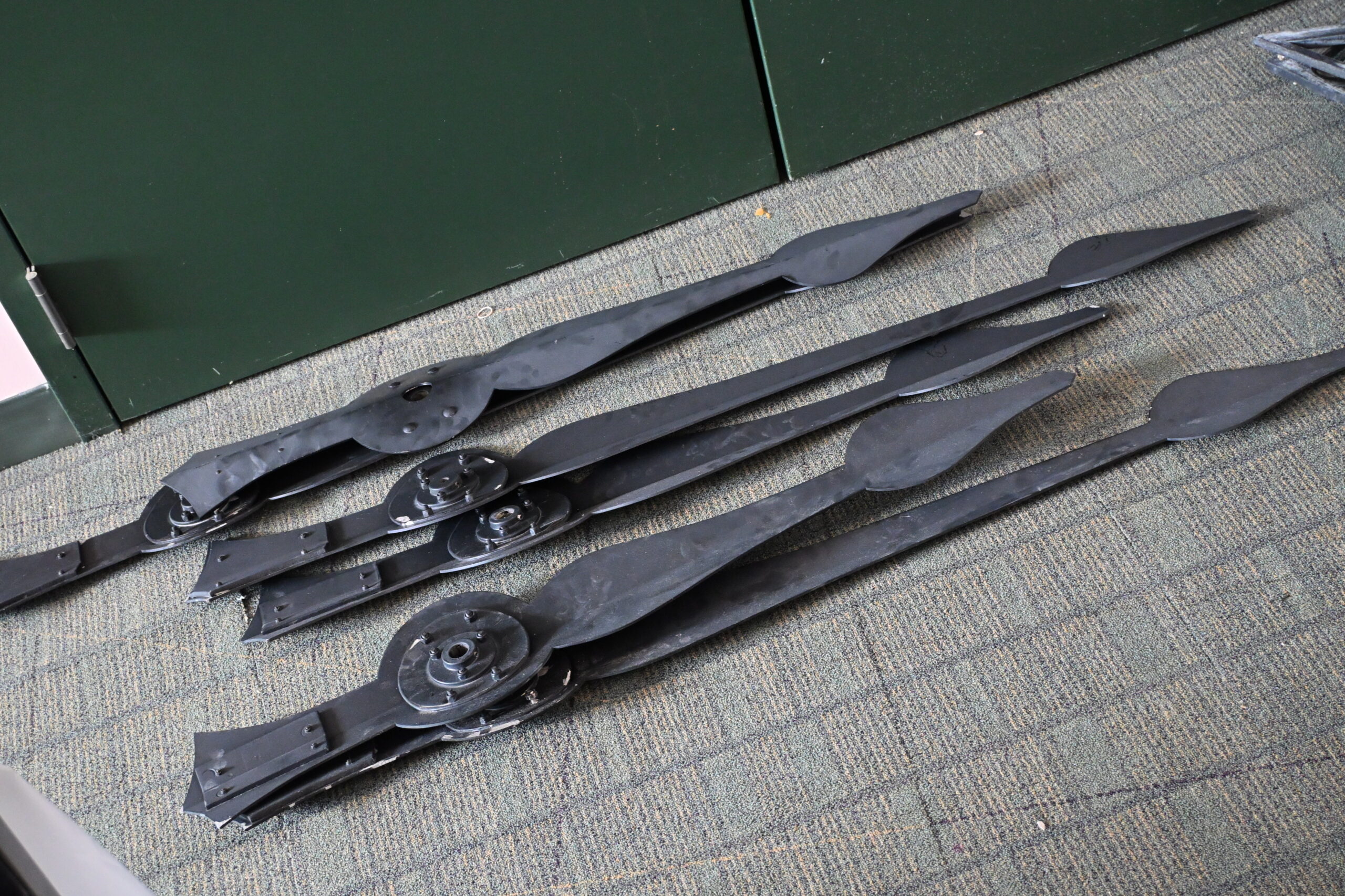 Clock hands removed from building during construction